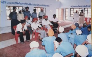 Dr Rajinder Singh delivering motivational talk to the patients in Drug De-Addiction centre, Cheema